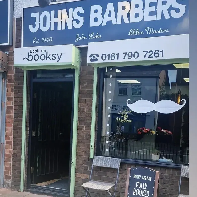 The John's Barbers shopfront on Walkden Road